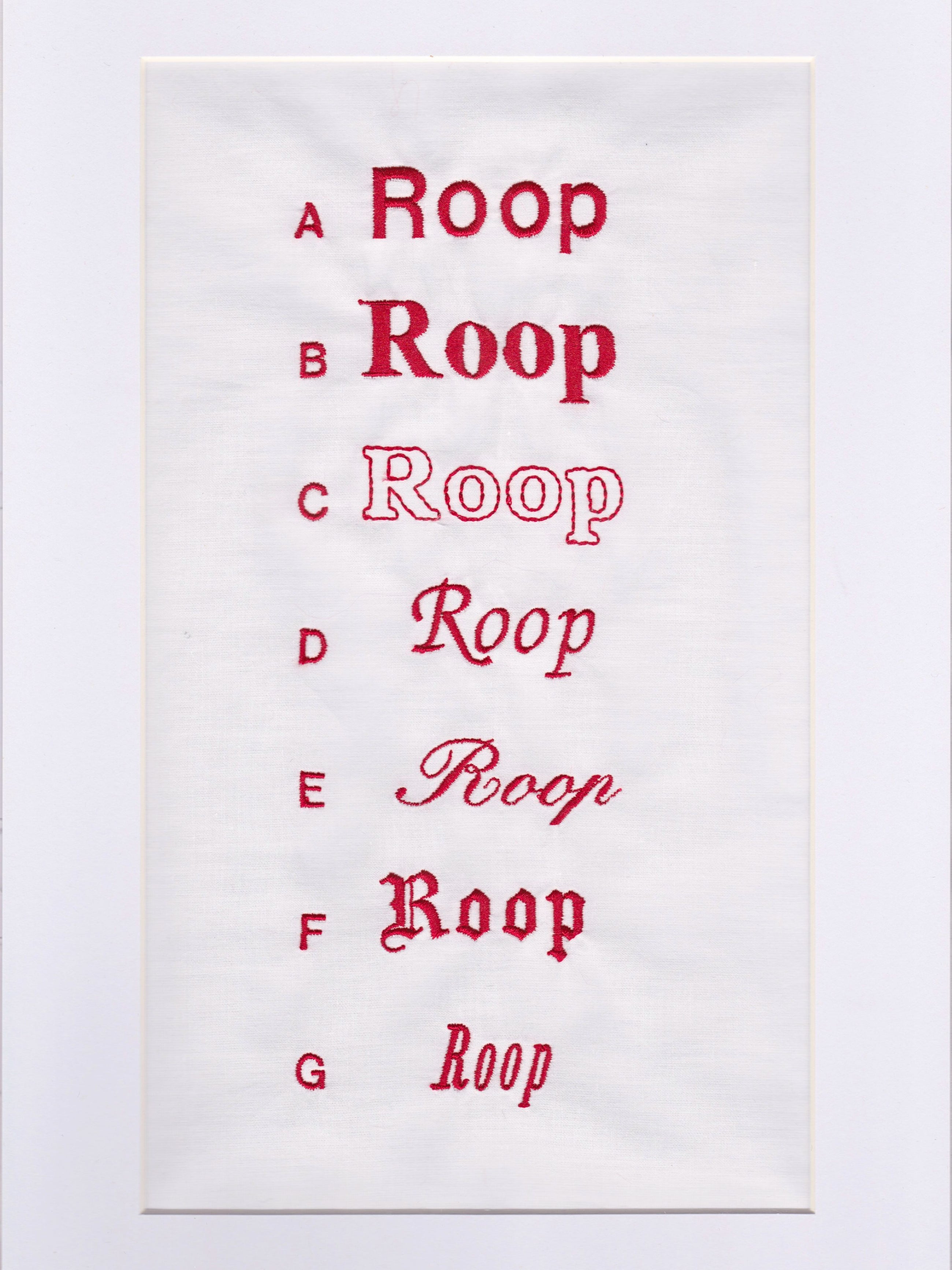 Sample chart of red embroidered fonts. A-G list of ROOP embroidered in different fonts. On a white background.