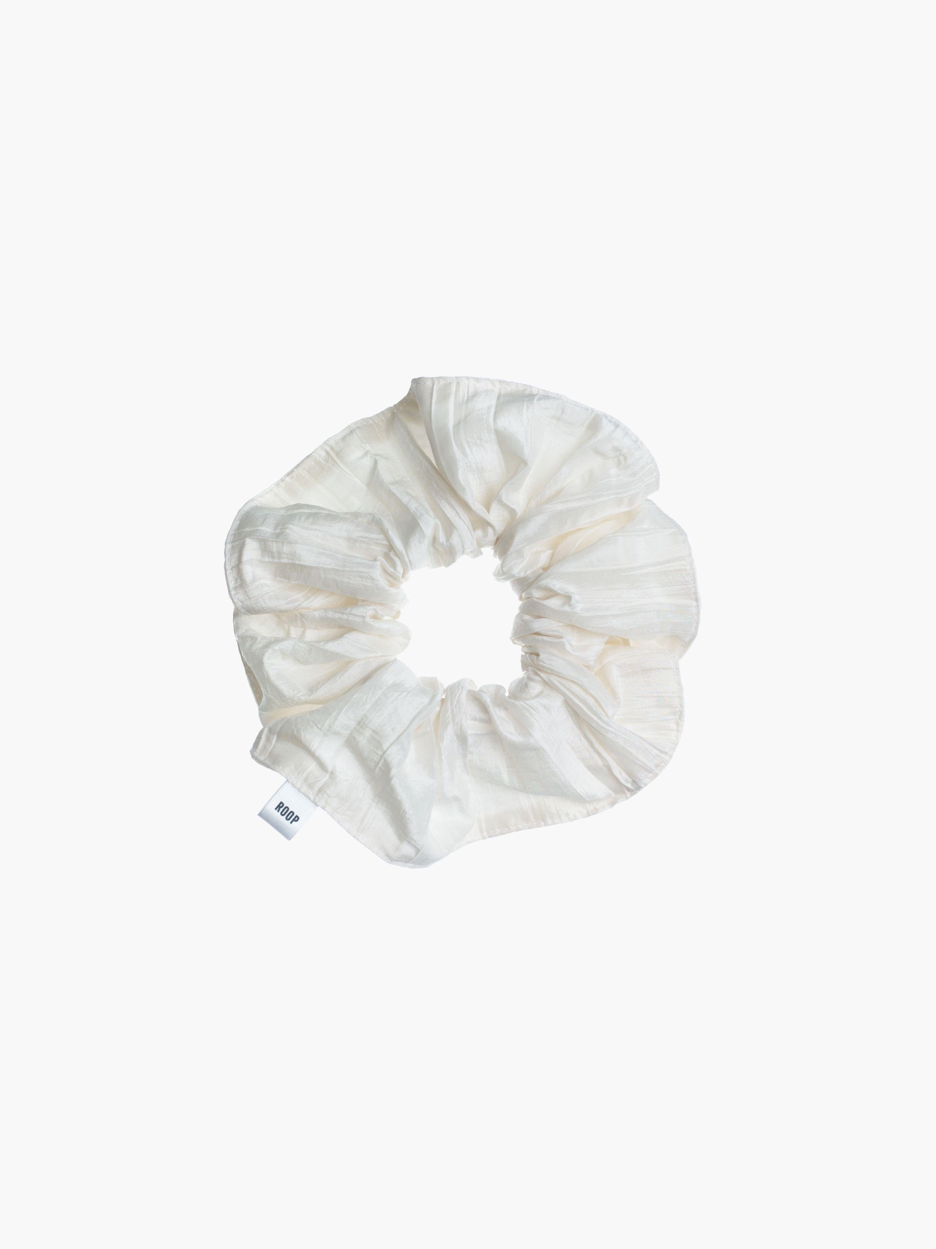 Ivory crinkle taffeta scrunchie on a white background