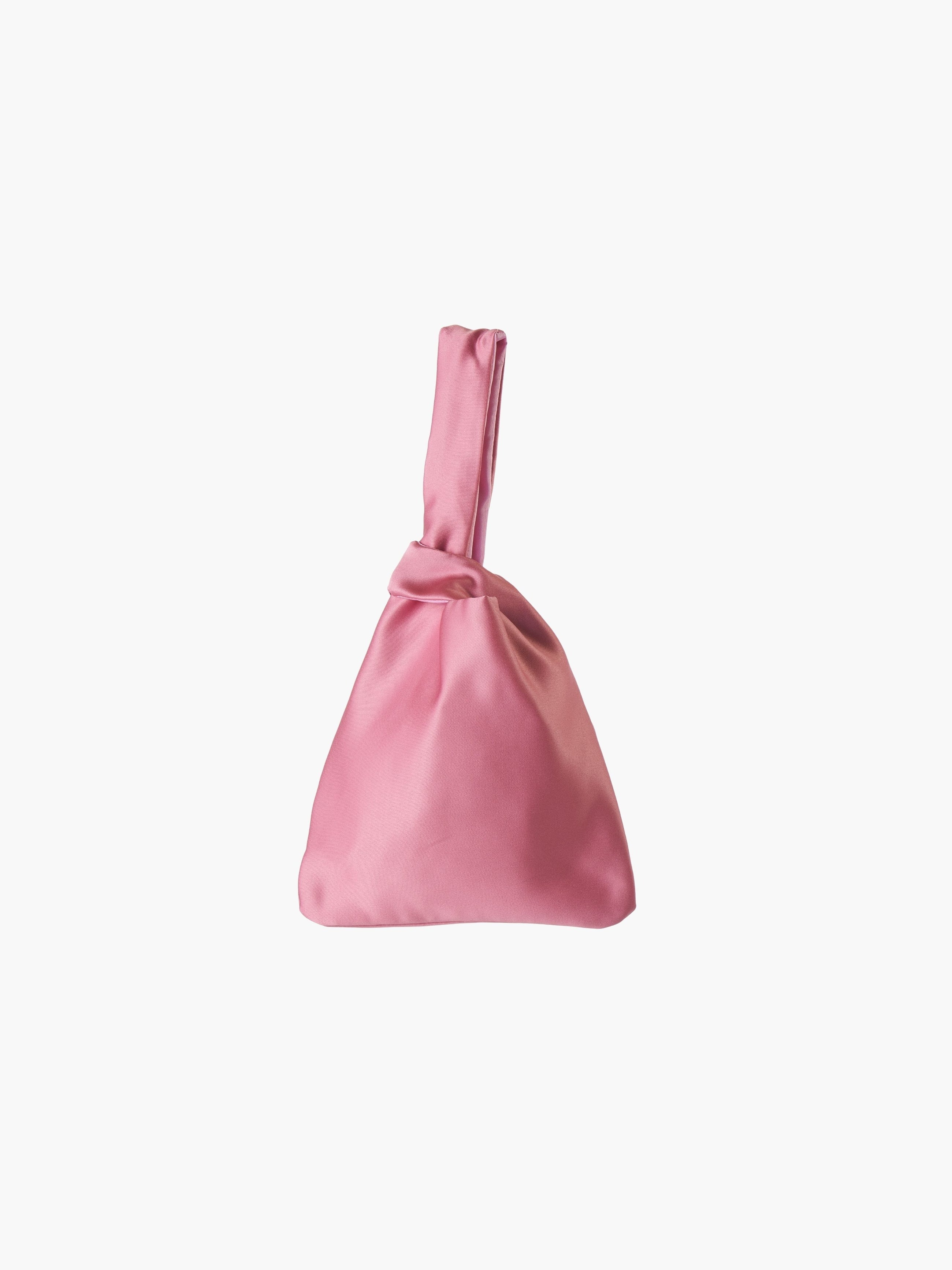 Rose satin knot bag against a plain white background. The elegant bag has a twisted handle and sleek, glossy fabric, exuding a chic, minimalist style.