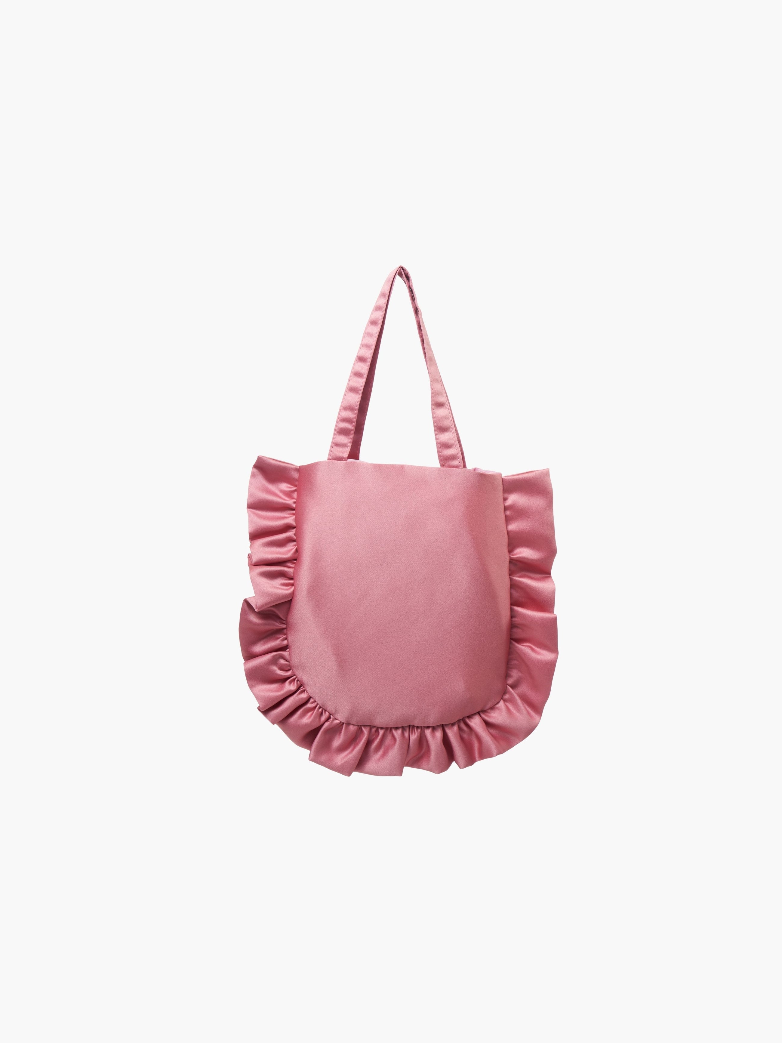 A rose pink satin tote bag with ruffled edges on the sides and bottom. It features matching handles, set against a plain white background.