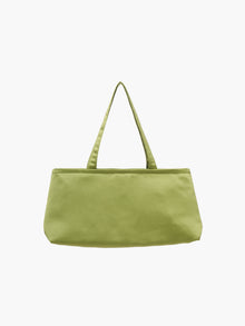 A sleek apple green handbag with a minimalist design, featuring a rectangular shape and two thin straps. The tone is elegant and versatile against a plain white background.