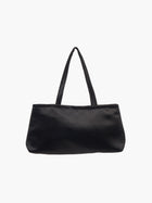 A sleek black handbag with a minimalist design, featuring a rectangular shape and two thin straps. The tone is elegant and versatile against a plain white background.