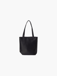 A black satin tote bag with. It features matching handles, set against a plain white background.