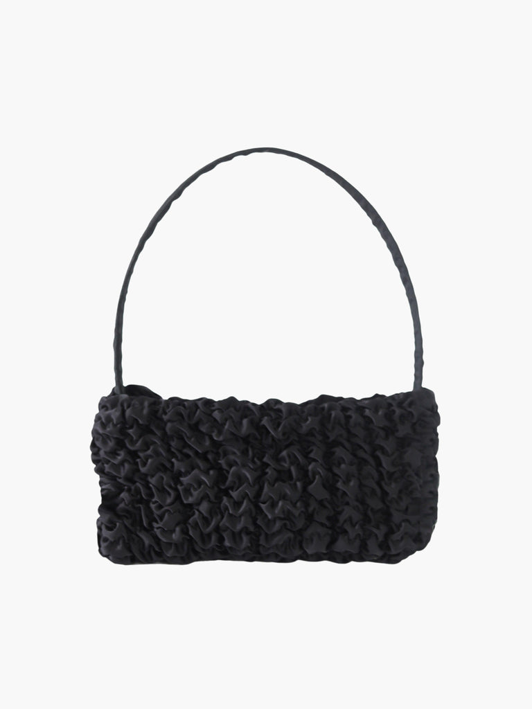 black satin textured ruched front handbag on a white background.