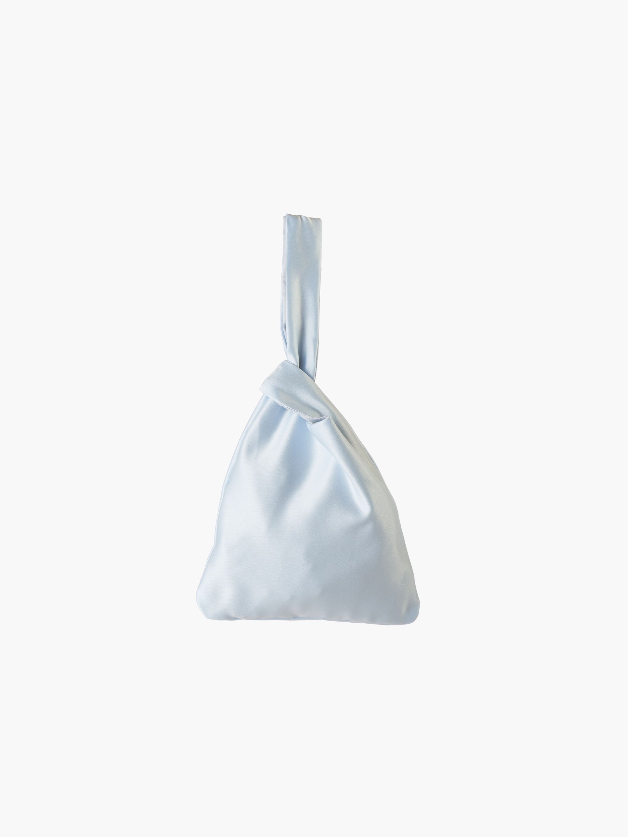 Blue satin knot bag against a plain white background. The elegant bag has a twisted handle and sleek, glossy fabric, exuding a chic, minimalist style.
