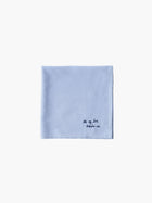 A blue cotton embroidered square handkerchief, embroidered with "all my love" in black.