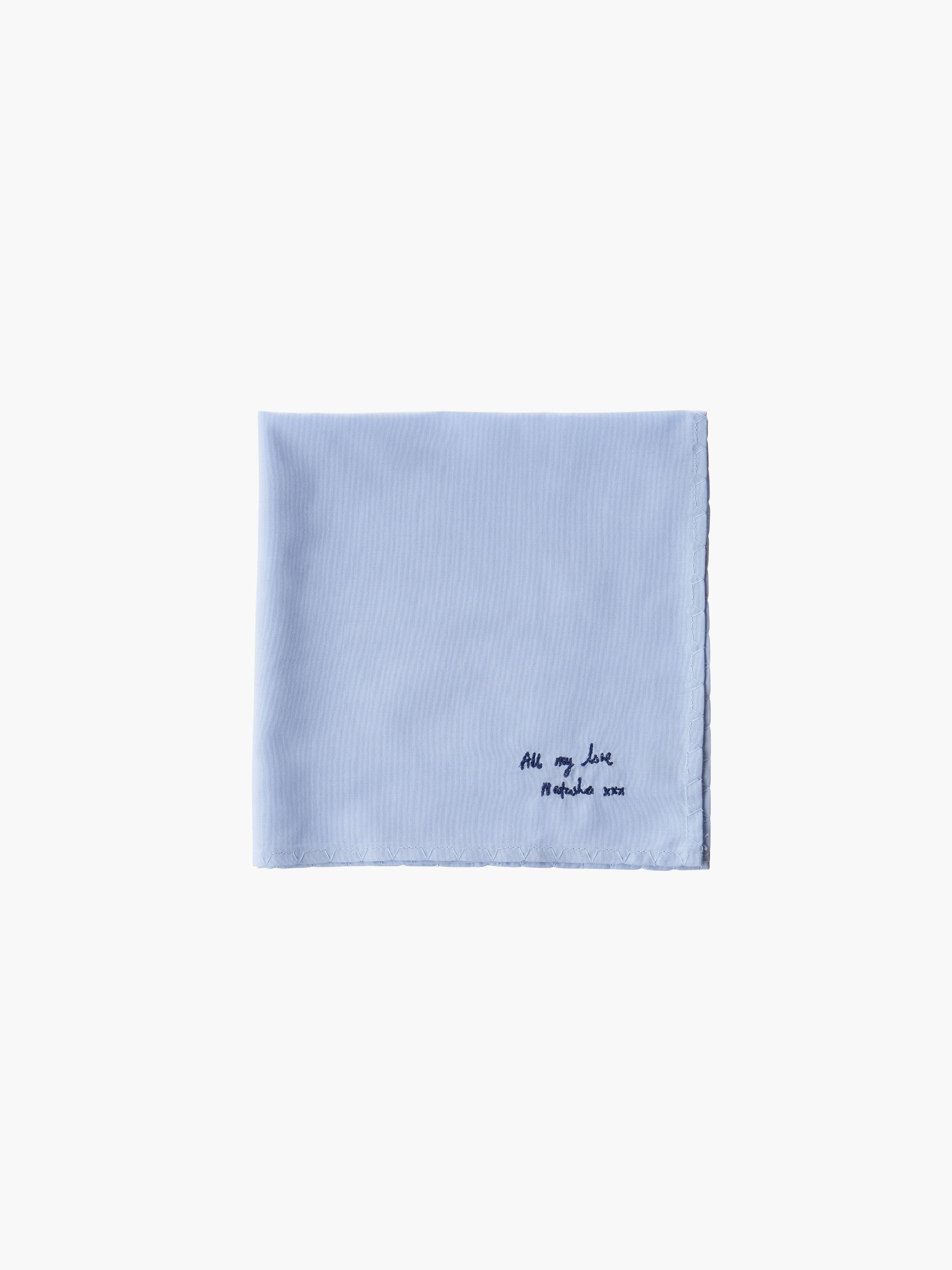 A blue cotton embroidered square handkerchief, embroidered with "all my love" in black.