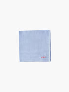 A blue cotton embroidered square handkerchief, embroidered with initials and a love heart in pink.