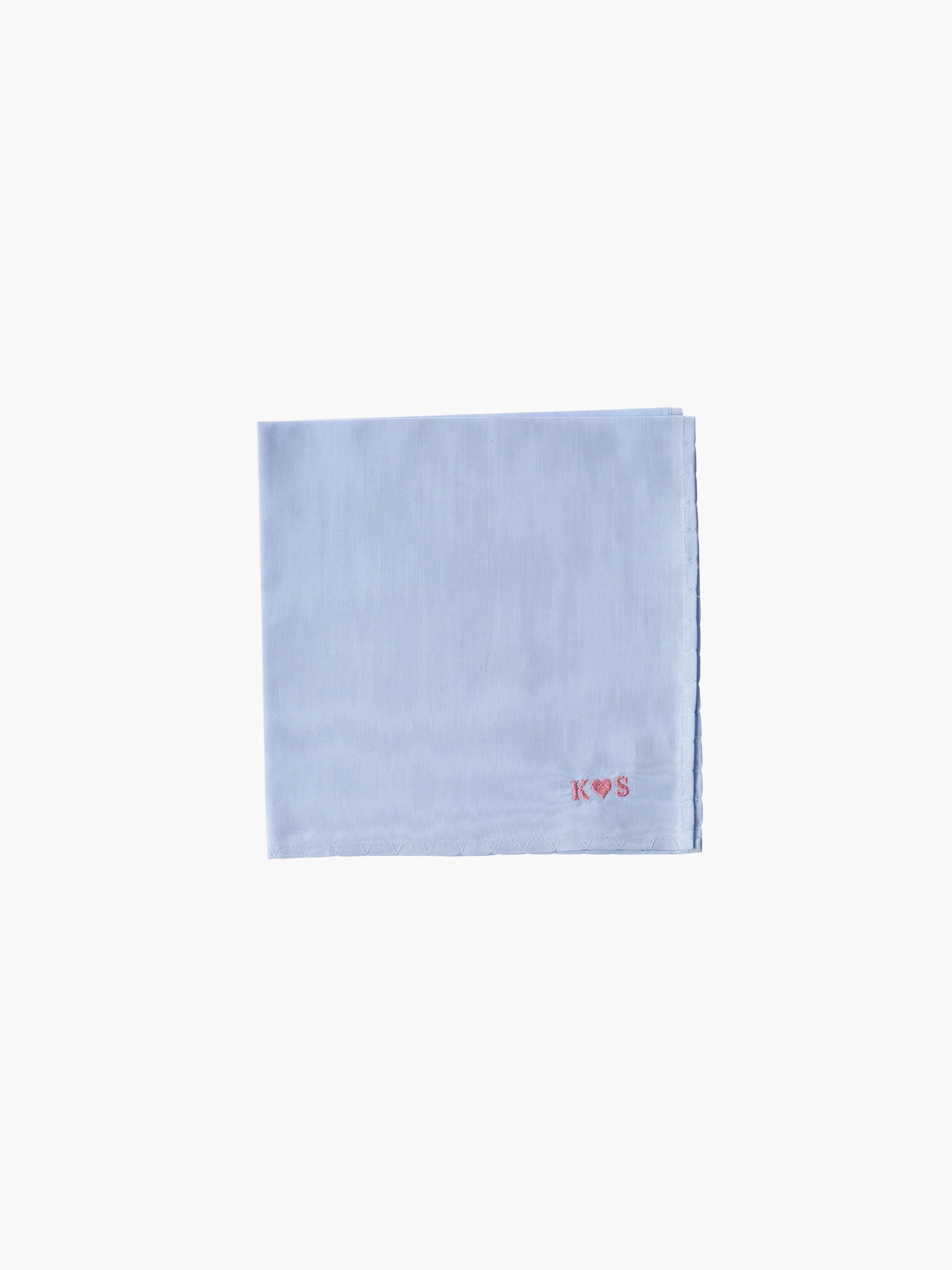 A blue cotton embroidered square handkerchief, embroidered with initials and a love heart in pink.