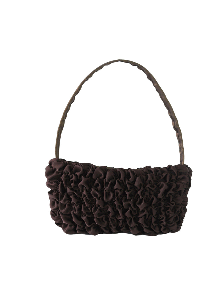 brown satin textured ruched front handbag on a white background.