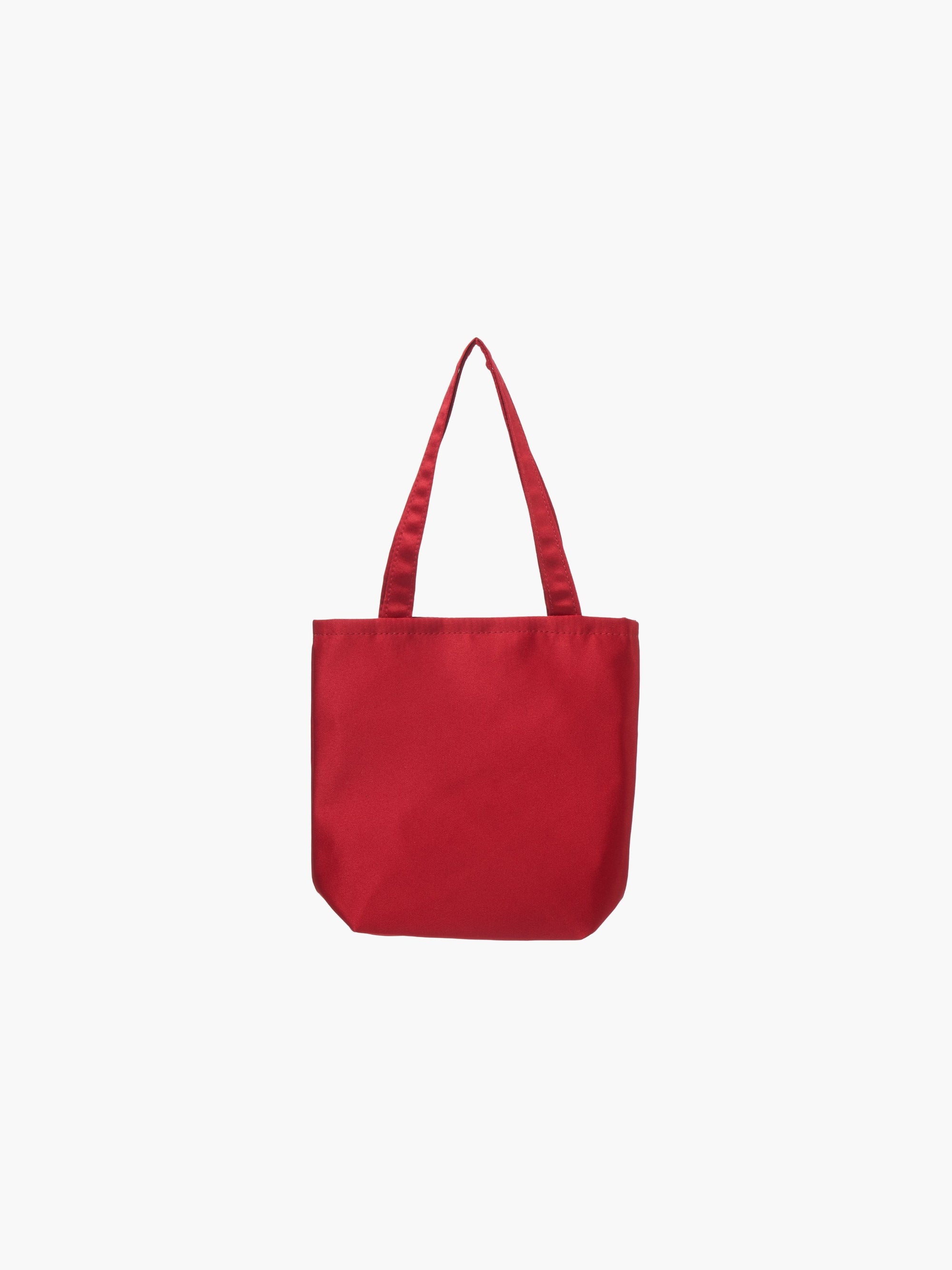 A burgundy satin tote bag with. It features matching handles, set against a plain white background.