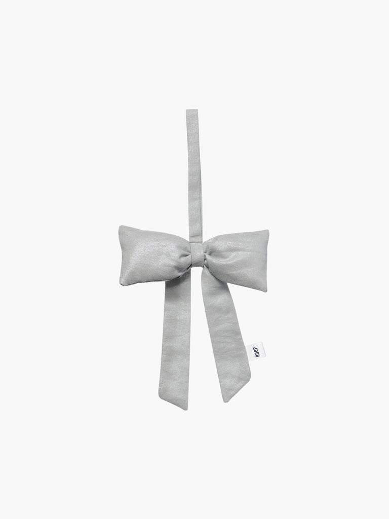 A light grey / silver padded bow decoration with a long, slim loop for hanging.
