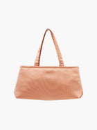A sleek copper handbag with a minimalist design, featuring a rectangular shape and two thin straps. The tone is elegant and versatile against a plain white background.