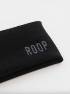Black stretch headband with 'ROOP' embroidery on a white background