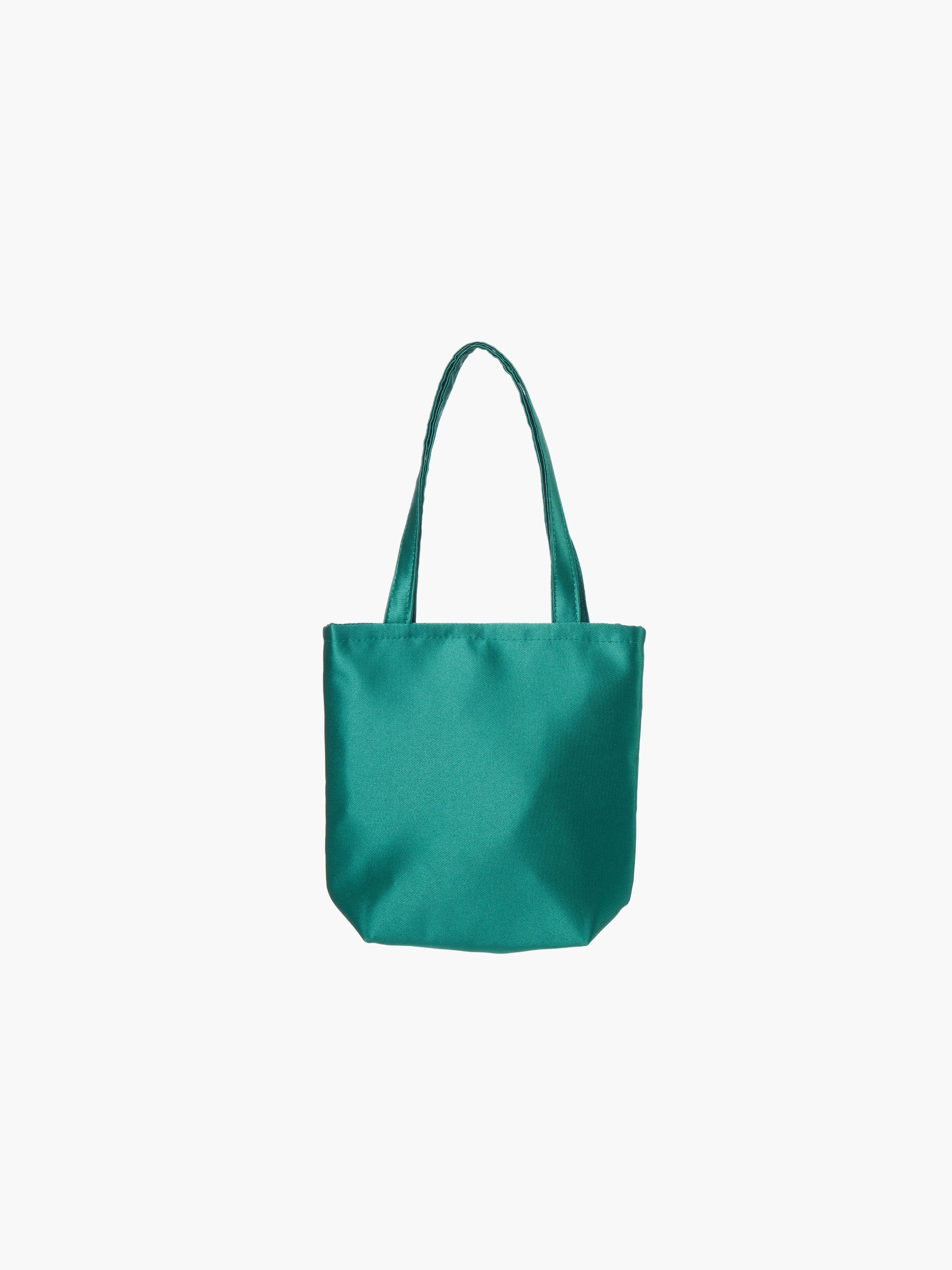 An emerald green satin tote bag. It features matching handles, set against a plain white background.