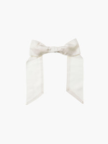 Ivory bamboo silk satin hair bow clip on a white background
