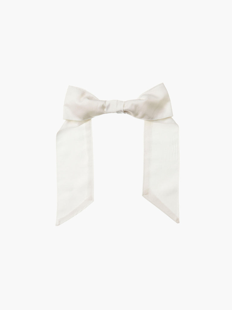 Ivory bamboo silk satin hair bow clip on a white background