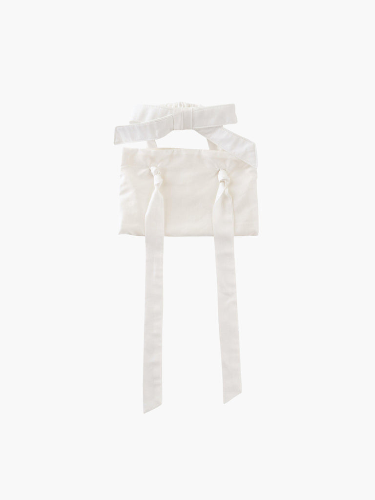 ivory bamboo silk satin wristlet bracelet bridal bag on white background