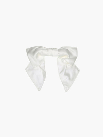 Ivory bamboo silk satin bridal hair bow scrunchie. Set on a white background.