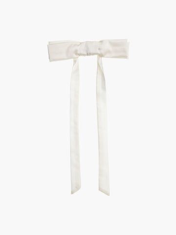 Ivory bamboo silk satin bow hair clip on a white background