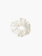 Ivory bamboo silk satin scrunchie on a white background