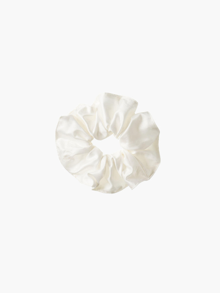 Ivory bamboo silk satin scrunchie on a white background