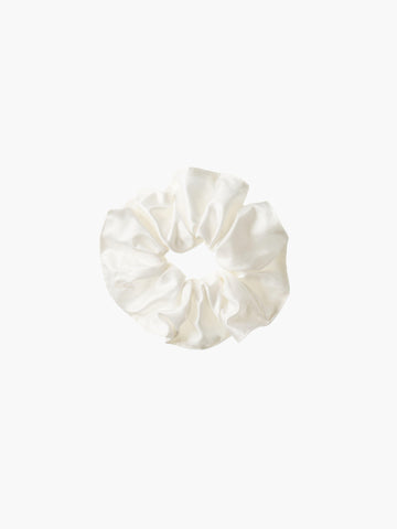 Ivory bamboo silk satin scrunchie on a white background