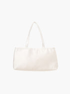 An ivory satin baguette shape handbag with two handles. 