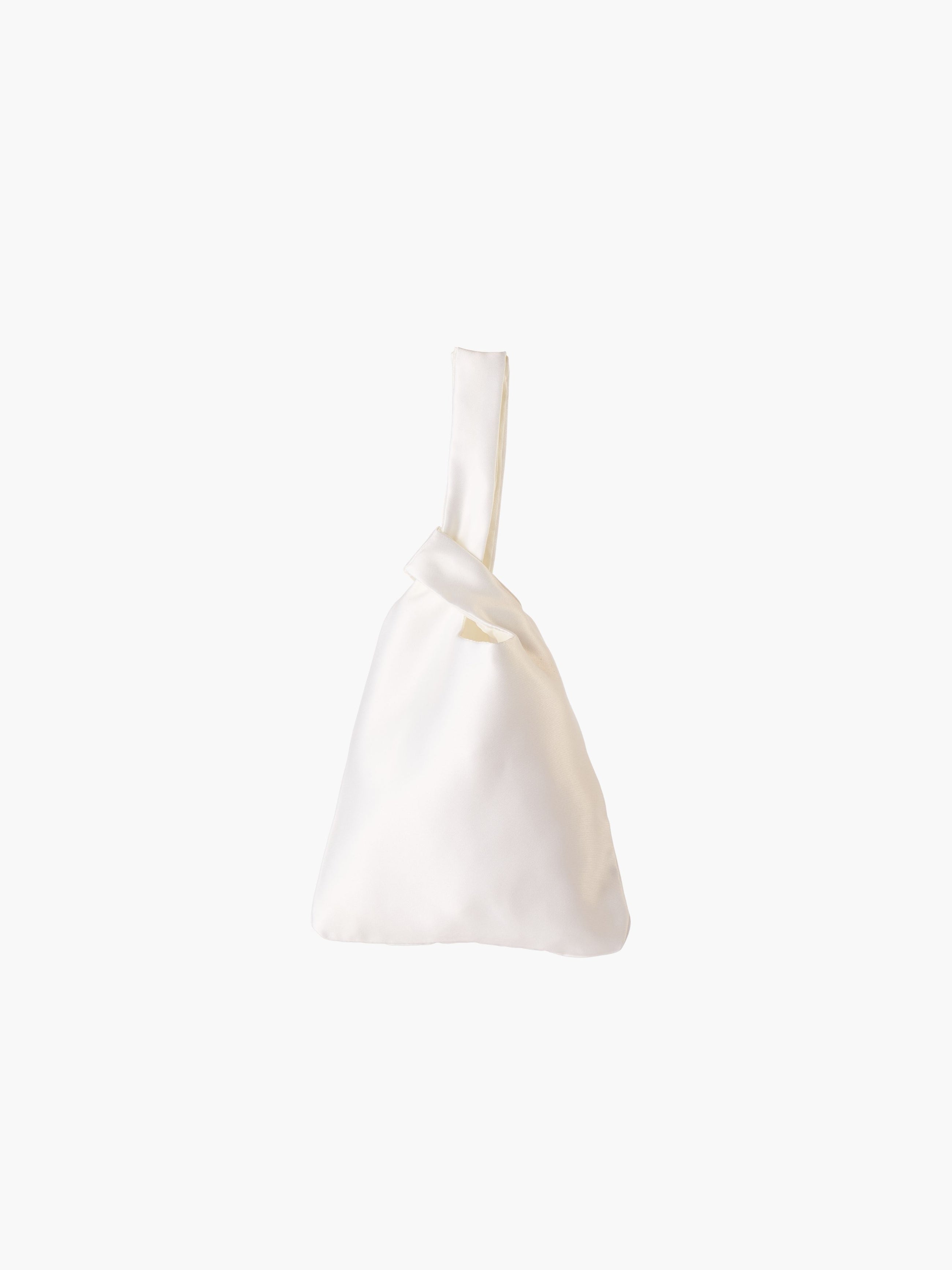 Ivory satin knot bag against a plain white background. The elegant bag has a twisted handle and sleek, glossy fabric, exuding a chic, minimalist style.