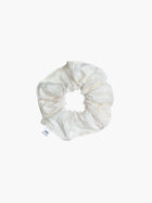 Ivory crinkle taffeta scrunchie on a white background