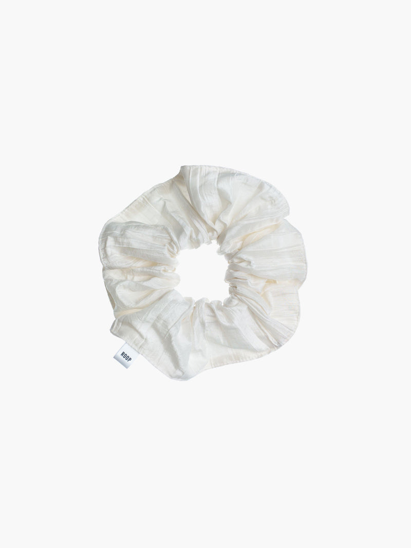 Ivory crinkle taffeta scrunchie on a white background