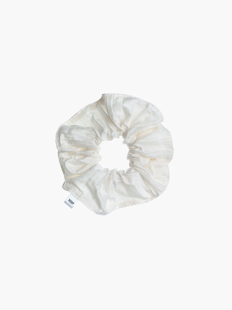 Ivory crinkle taffeta scrunchie on a white background