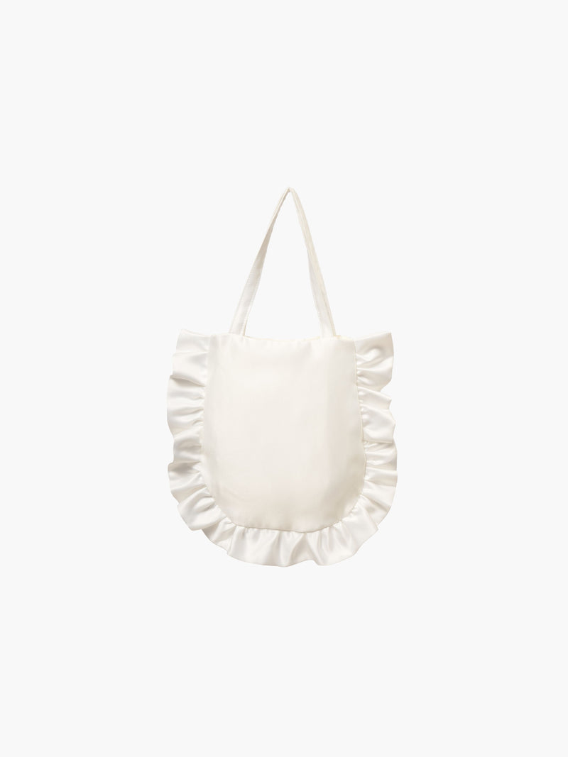 An ivory satin tote bag with ruffled edges on the sides and bottom. It features matching handles, set against a plain white background.