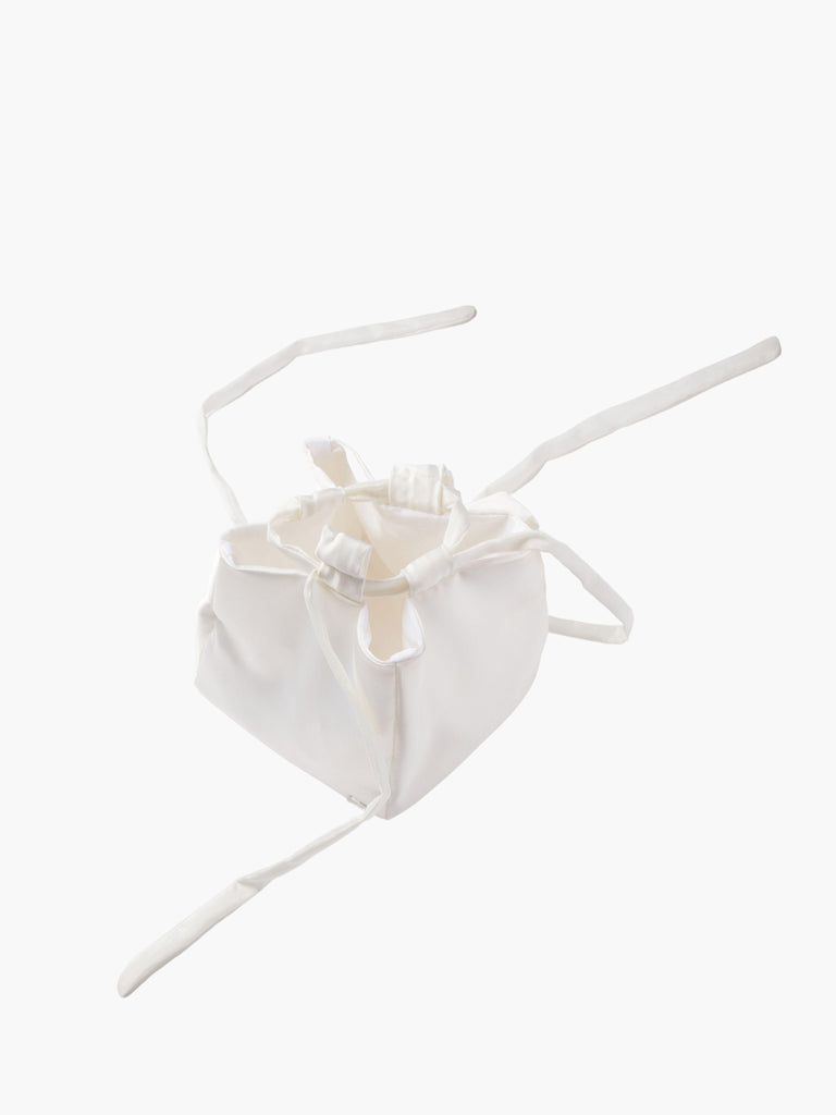 Ivory satin box drawstring handbag with ribbon drawstring details, open to reveal interior, set on a white background