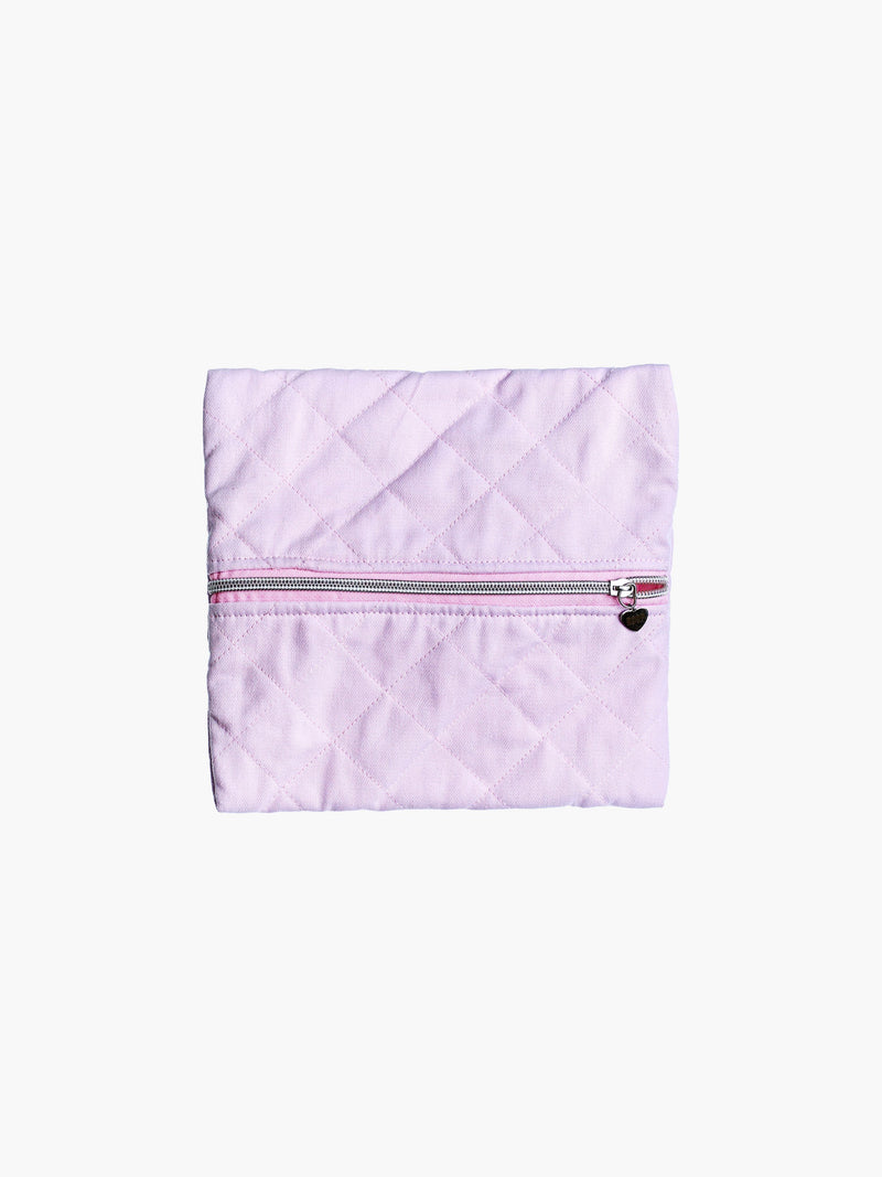 A quilted pink cotton zipper pouch, the zip has a heart charm on it. Set on a white background.