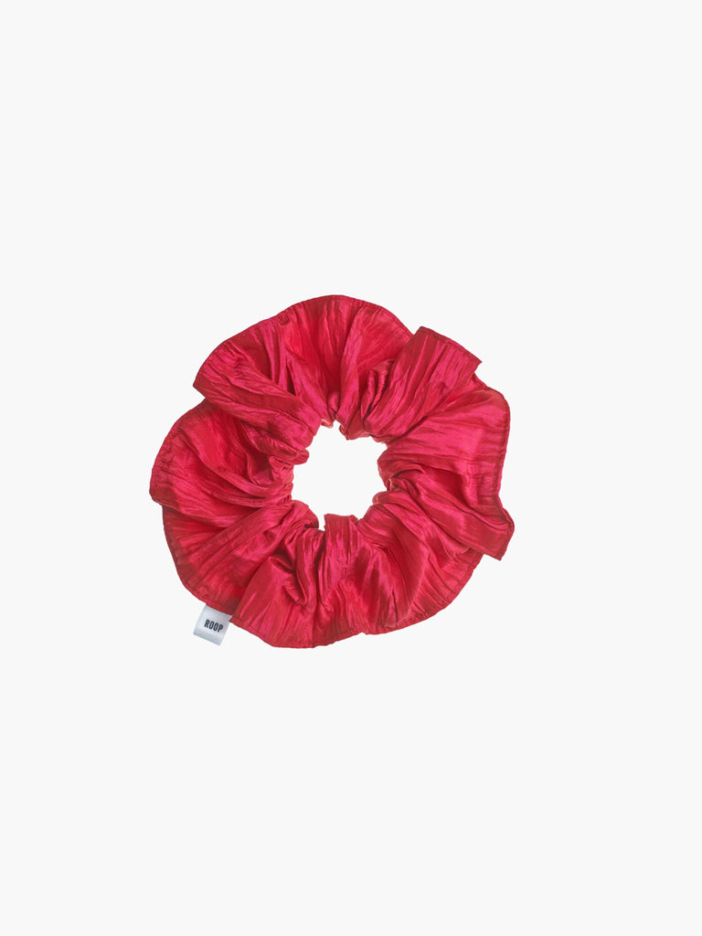 Raspberry pink crinkle taffeta scrunchie on a white background