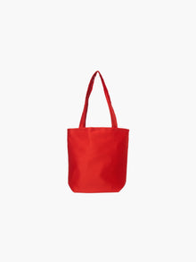 A red satin tote bag with. It features matching handles, set against a plain white background.