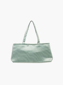 A sea green, rectangular handbag with two thin handles, set against a plain white background. The bag design is simple and elegant.