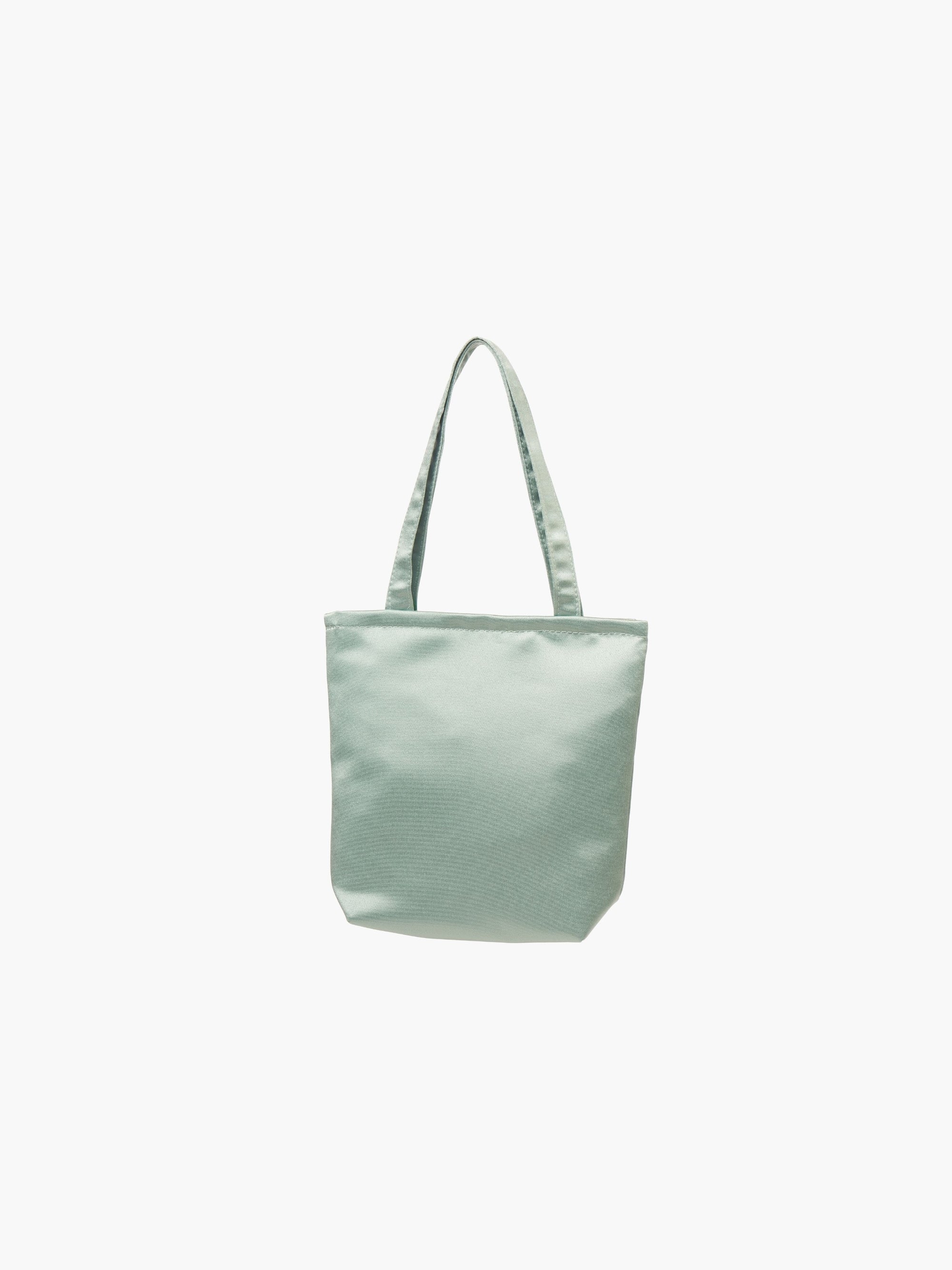 A sea green satin tote bag. It features matching handles, set against a plain white background.