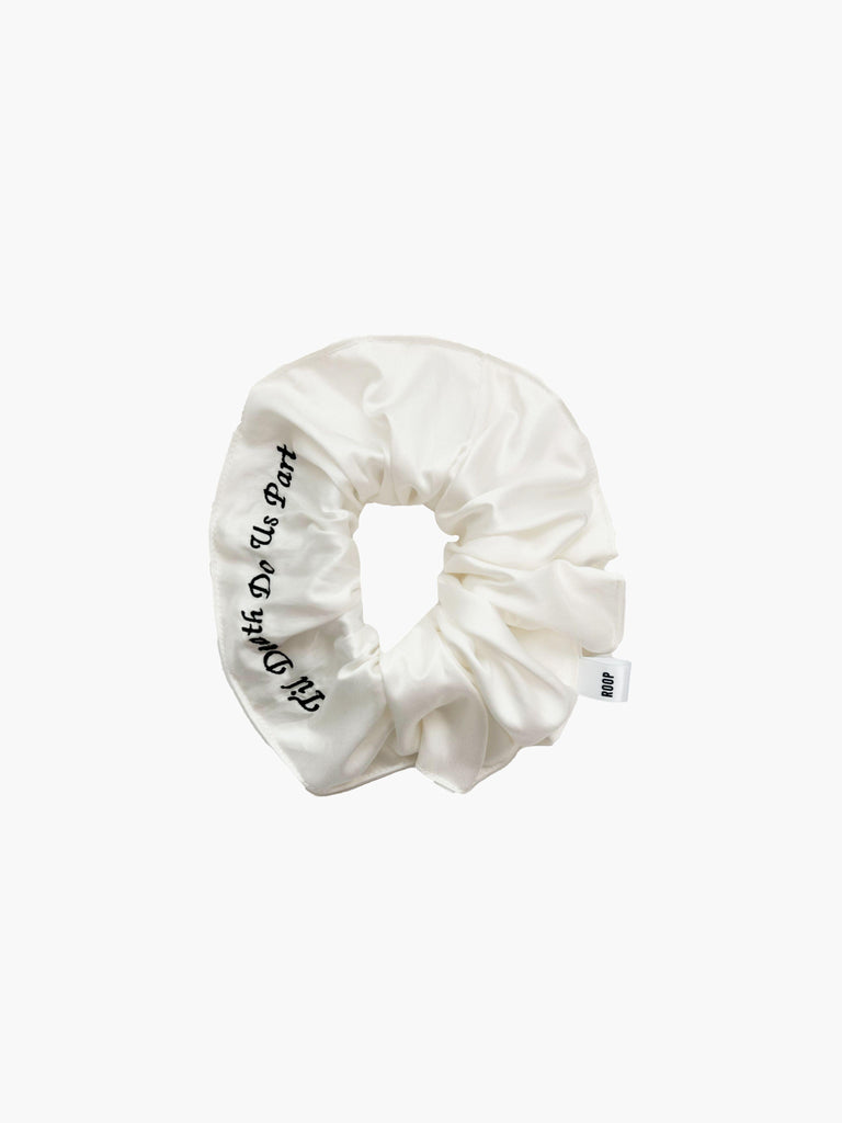 Ivory bamboo silk satin scrunchie with 'Til Death Do Us Part' embroidered in black on a white background.