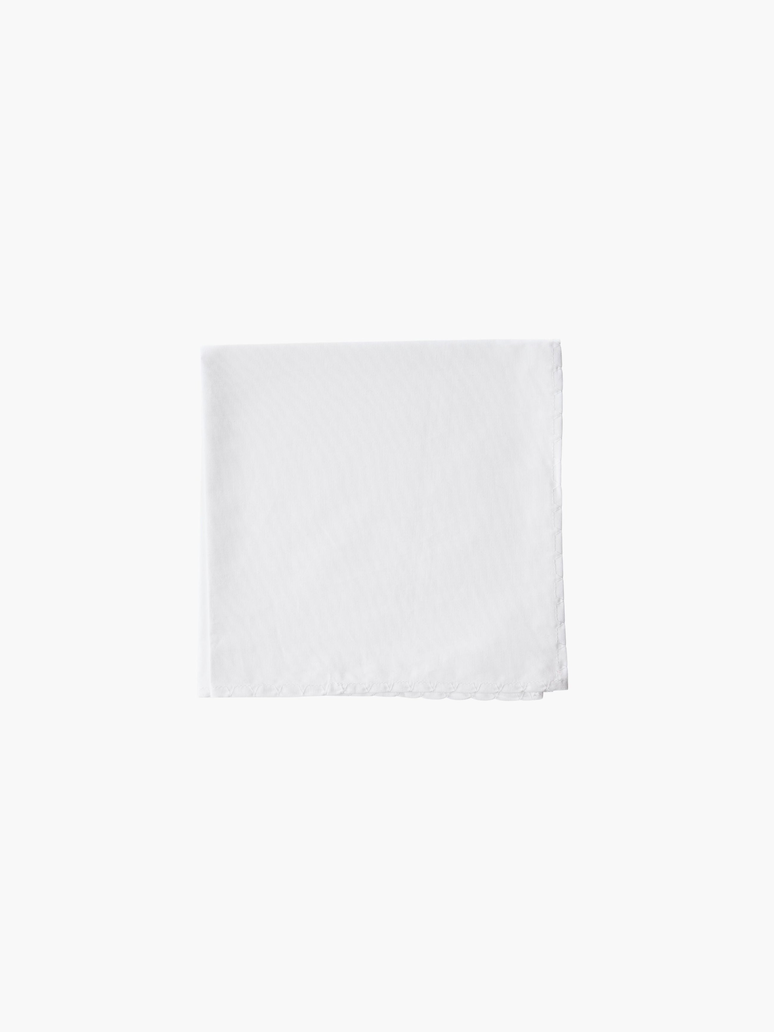 A blank white cotton folded square handkerchief.