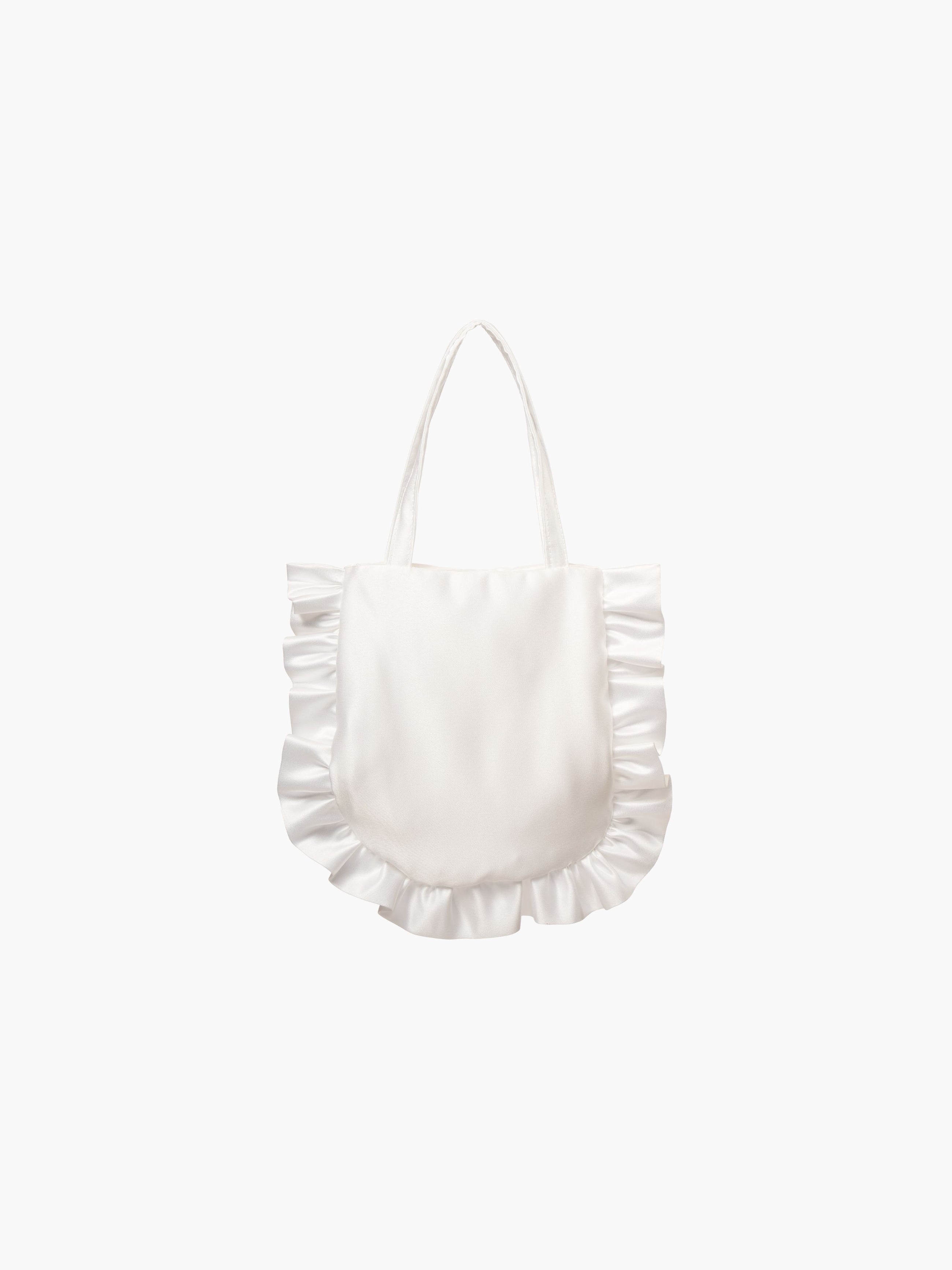 A white satin tote bag with ruffled edges on the sides and bottom. It features matching handles, set against a plain white background.